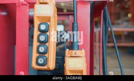 Remote control push button switch for control panel lifting industrial mechanism swivel chain hook Stock Photo
