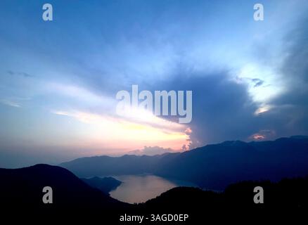 Majestic Mountain Sunset Over the Lake Stock Photo