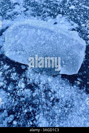 Close-Up of Ice Formation on Ground Stock Photo