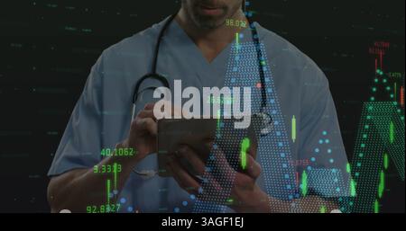 Financial data processing against mid section of male health worker using digital tablet Stock Photo