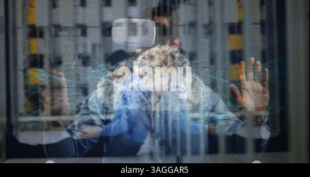 Digital composite of businessman using VR, touching screen and having a digital cloud image appear, Stock Photo