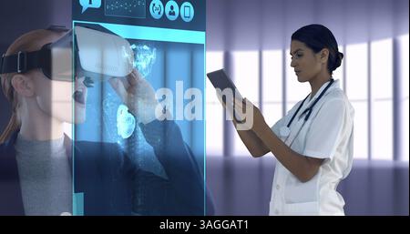 Doctor using tablet, virtual reality image over medical professional examining data Stock Photo