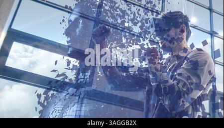 Man interacting with fragmented digital human figure, image over modern office background Stock Photo