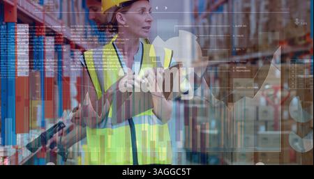 Financial and statistical data processing against female worker checking stock in warehouse Stock Photo