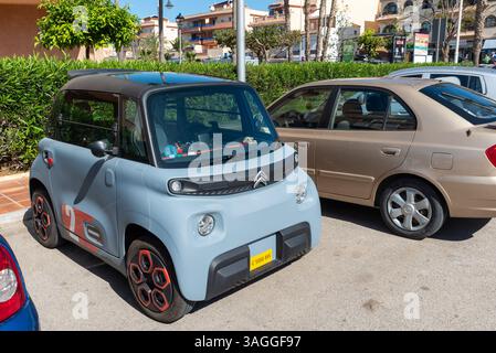 Citroen Ami, ev, electric vehicle in Torrox Costa, Spain, Europe. Citroën Ami is a two-door, battery-electric quadricycle Stock Photo