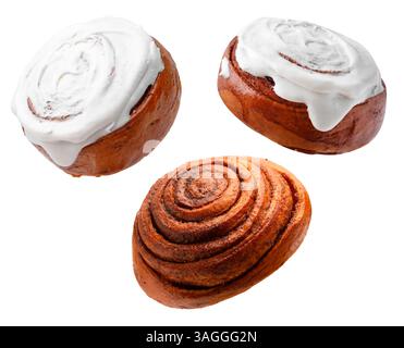 Tasty cinnamon rolls in air on white background Stock Photo