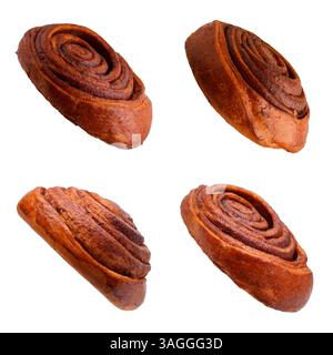 Tasty cinnamon rolls in air on white background Stock Photo