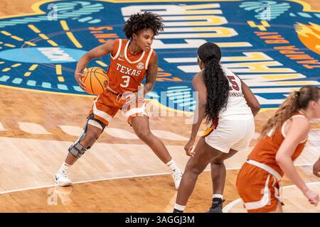 Texas guard Rori Harmon (3) dribbles during an NCAA college basketball ...