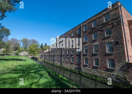 Quarry Bank Mill (also known as Styal Mill) in Styal, Cheshire, England, is one of the best preserved textile factories of the Industrial Revolution. Stock Photo