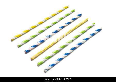 Different paper drinking straws on white background Stock Photo