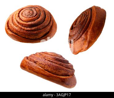 Tasty cinnamon rolls in air on white background Stock Photo