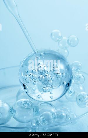 Abstract cosmetic laboratory. An artistic close-up of transparent molecules Stock Photo