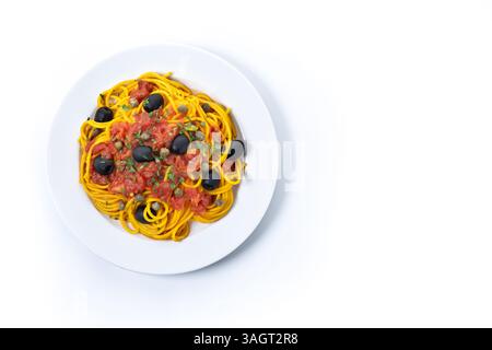 Italian Pasta puttanesca with tomato sauce, capers, and black olives isolated on white background Stock Photo