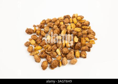 caramelized peanuts on a white background Stock Photo
