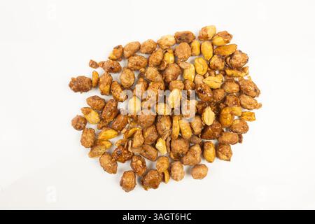 caramelized peanuts on a white background Stock Photo