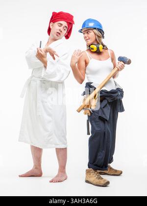 Full length portrait of a man enjoying a spa day contrasted by a female construction worker. Stock Photo
