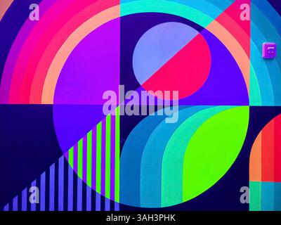 Dynamic Geometric Mural in Vibrant Colors Urban Eye-Level View Stock Photo