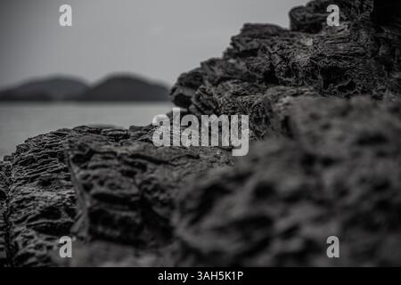 Close-Up of Dark Layered Rock Formation Stock Photo