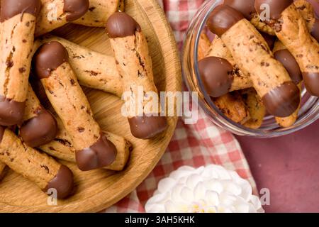 Sticks shortbread dipped in chocolate. Home made cookies. Stock Photo