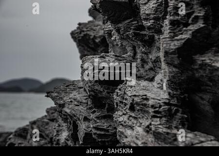 Close-Up of Dark Layered Rock Formation Stock Photo