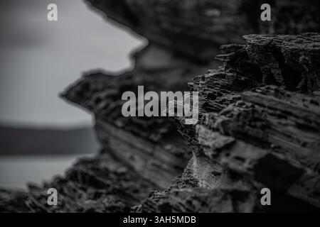 Close-Up of Dark Layered Rock Formation Stock Photo