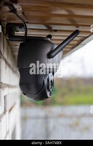 Modern cctv camera monitoring property ensuring safety and security Stock Photo