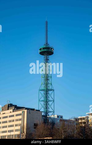 Elisa link tower or telecommunication tower against clear blue sky in Itä-Pasila district of Helsinki, Finland Stock Photo