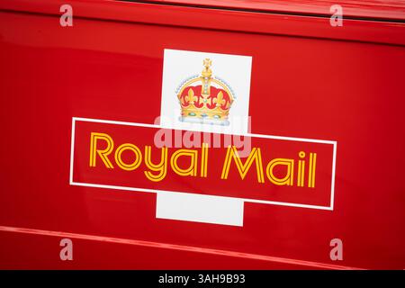 100% electric zero emissions vehicle - Royal Mail postal delivery van with Royal Mail livery and logo, Basingstoke, England. Concept: carbon reduction Stock Photo