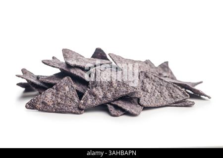 Dark nachos chips isolated on a white background. Stock Photo