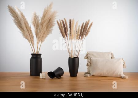 Pampas Grass and Cushions: Boho Interior Still Life with Candles Stock Photo