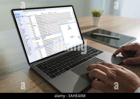 Email message communication man Hands typing on laptop open email and chat business communication contact Stock Photo