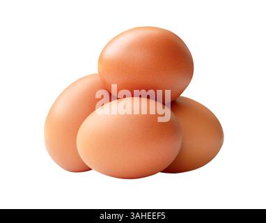 Four brown chicken eggs in stack are isolated on white background with clipping path. Stock Photo
