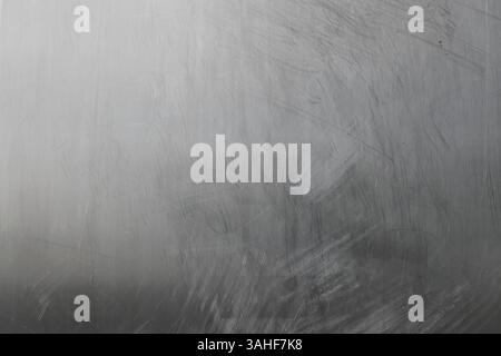 Close-up old brushed aluminum alloy sheet with scratched wrinkle background Stock Photo