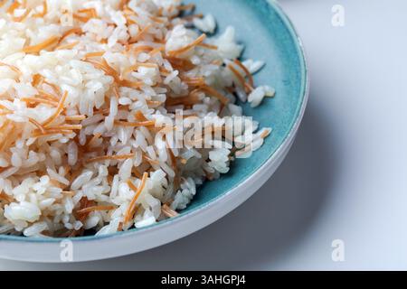 Rice pilaf with vermicelli in ceramic bowl. Stock Photo