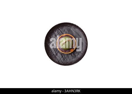 Easter sweet cake or tart in the shape of an egg. Sweets for the table of the religious feast of Easter Stock Photo
