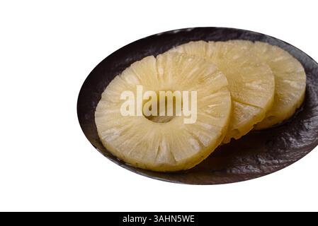 Tropical fruit pineapple in rings or slices tinned sweet yellow colour Stock Photo