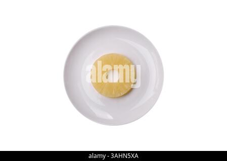 Tropical fruit pineapple in rings or slices tinned sweet yellow colour Stock Photo