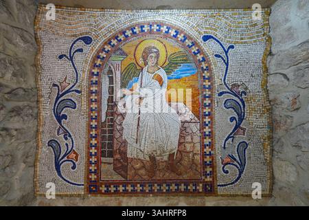 Mosaics on the rock face of the cliff where the upper Ostrog Monastery of the Serbian Orthodox Church was built - This is the most popular pilgrimage Stock Photo