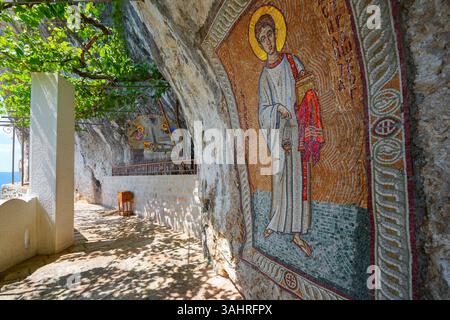 Mosaics on the rock face of the cliff where the upper Ostrog Monastery of the Serbian Orthodox Church was built - This is the most popular pilgrimage Stock Photo