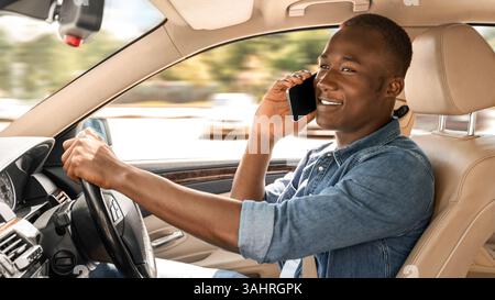 Cheerful afro american man driver having phone conversation Stock Photo