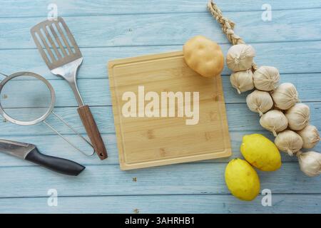 Cooking preparation with fresh ingredients on a wooden board Stock Photo