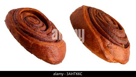 Tasty cinnamon rolls in air on white background Stock Photo