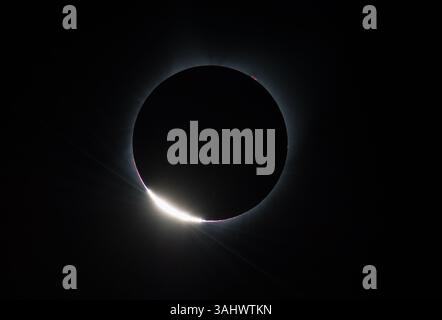 August 21, 2017 - Madras, Oregon, U.S. - The Diamond Ring  effect is seen as the moon makes its final move over the sun during the total solar eclipse on Monday, Augustust 21, 2017 above Madras, Oregon. A total solar eclipse swept across a narrow portion of the contiguous United States from Lincoln Beach, Oregon to Charleston, South Carolina. A partial solar eclipse was visible across the entire North American continent along with parts of South America, Africa, and Europe. (Credit Image: © Aubrey Gemignani/NASA via ZUMA Wire/ZUMAPRESS.com) Stock Photo