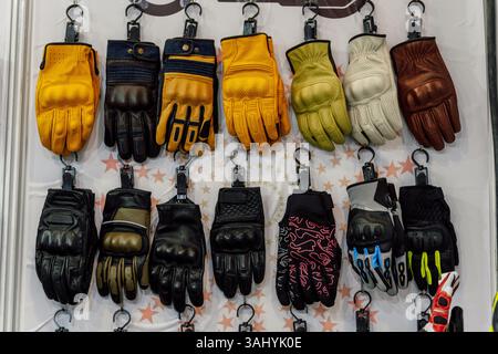 motorcycle gloves in the store. gloves for a person riding a scooter Stock Photo