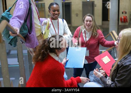 Disabled students talking at university Stock Photo