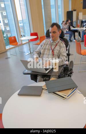 Students in wheelchair at university Stock Photo