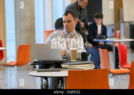 Students in wheelchair at university Stock Photo