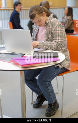 Student with Down syndrome at university Stock Photo