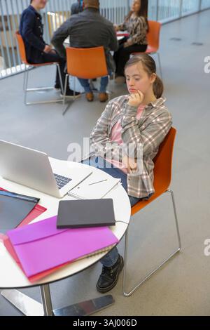Student with Down syndrome at university Stock Photo