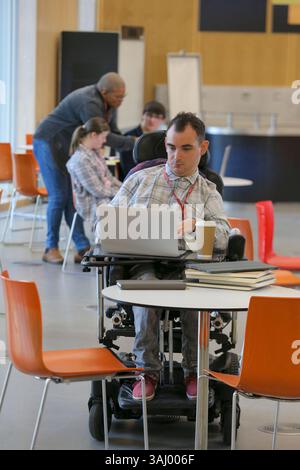 Students in wheelchair at university Stock Photo
